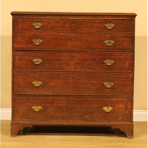 4 - A George III oak secretaire chest, of four long drawers, the upper disguised as two, with fall front... 