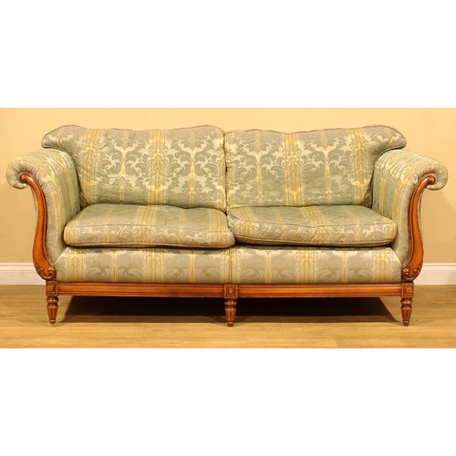 18 - A Medallion Mendelssohn sofa, 203cm wide; a conforming armchair, 94cm wide (2)