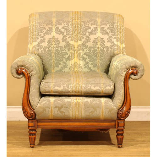 18 - A Medallion Mendelssohn sofa, 203cm wide; a conforming armchair, 94cm wide (2)