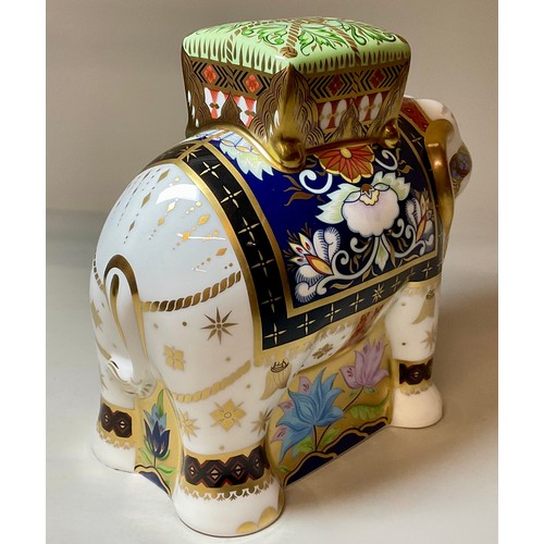 3016 - A Royal Crown Derby paperweight, Father Elephant, with howdah, gold stopper, 15.5cm high, 17cm long,... 