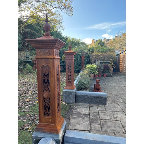 A pair of large very handsome classical cast iron gate posts in natural ...