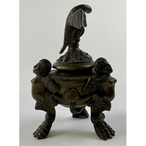 3016 - A 19th century Continental patinated bronze inkwell and cover, eagle finial, cast throughout with ch... 