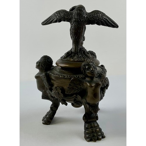 3016 - A 19th century Continental patinated bronze inkwell and cover, eagle finial, cast throughout with ch... 