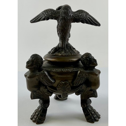 3016 - A 19th century Continental patinated bronze inkwell and cover, eagle finial, cast throughout with ch... 