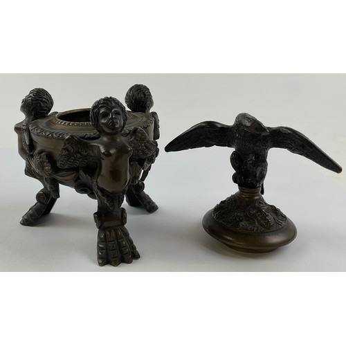 3016 - A 19th century Continental patinated bronze inkwell and cover, eagle finial, cast throughout with ch... 