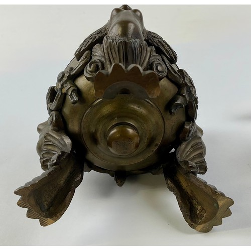 3016 - A 19th century Continental patinated bronze inkwell and cover, eagle finial, cast throughout with ch... 