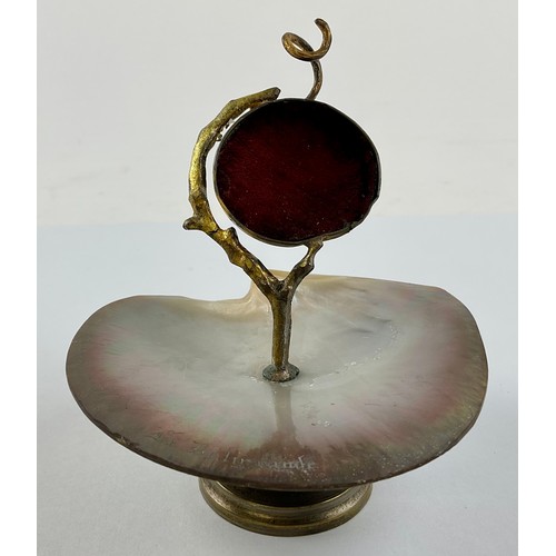 3018 - A French gilt metal and mother-of-pearl pocket watch stand, naturalistic support, 12cm high overall