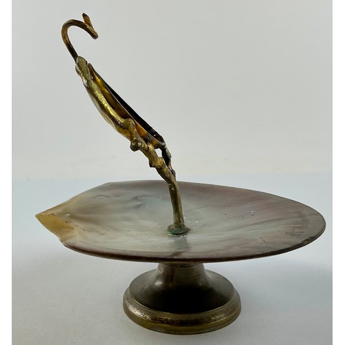 3018 - A French gilt metal and mother-of-pearl pocket watch stand, naturalistic support, 12cm high overall