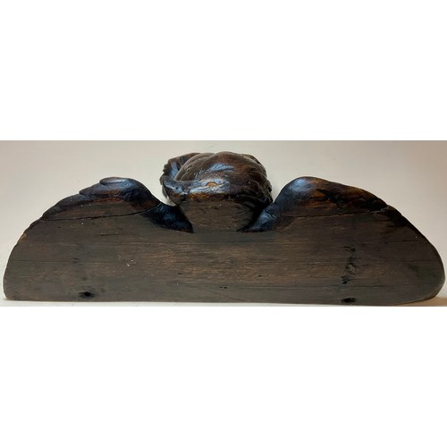 3004 - A Black Forest wall bracket, carved as an eagle, 25cm wide, c.1900