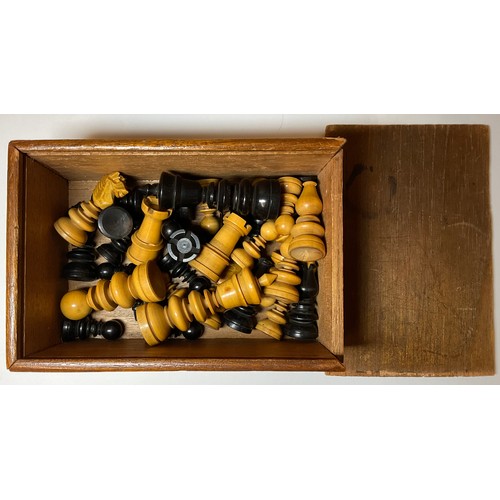 3007 - A boxwood and ebonised St George pattern chess set, the Kings 7cm high, mahogany box with sliding co... 