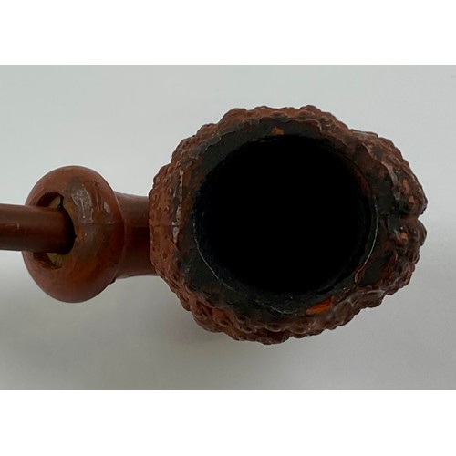 3020 - A French Orientalist figural pipe, the terracotta clay bowl modelleed as the head of a Nubian lady, ... 