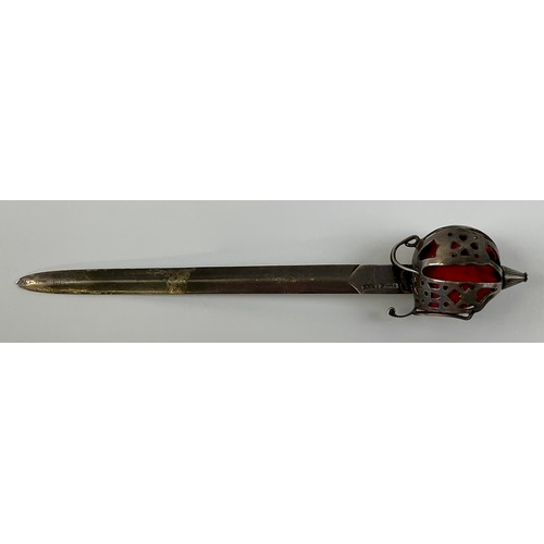 3056 - A George V silver novelty paper knife, as a Scottish officer's sword of the Highland light infantry,... 