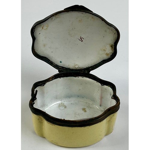3046 - A George III South Staffordshire enamel and copper mounted snuff box, the shaped hinged cover painte... 