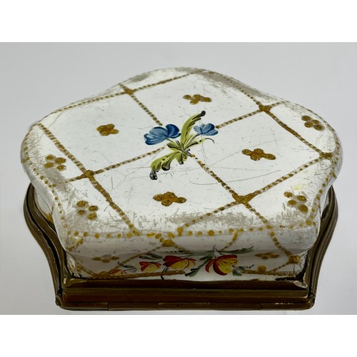 3040 - A George III South Staffordshire enamel and brass mounted snuff box, the hinged cover painted with a... 