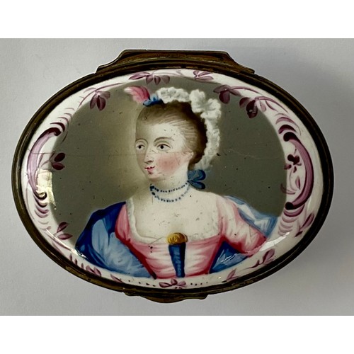 3035 - A George III South Staffordshire enamel and brass mounted oval snuff box, the hinged cover painted w... 