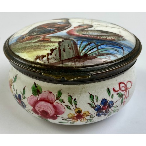 3032 - A George III South Staffordshire enamel and brass mounted circular snuff box, the hinged cover paint... 