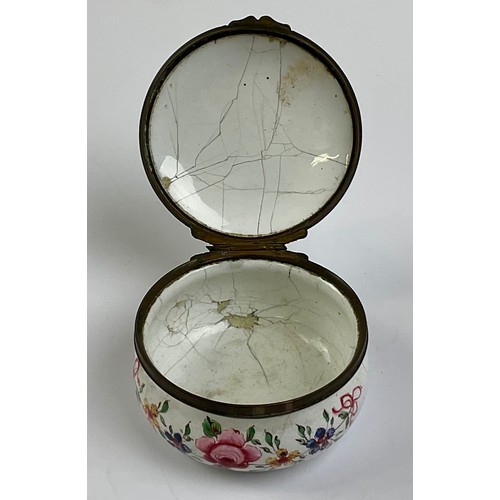 3032 - A George III South Staffordshire enamel and brass mounted circular snuff box, the hinged cover paint... 