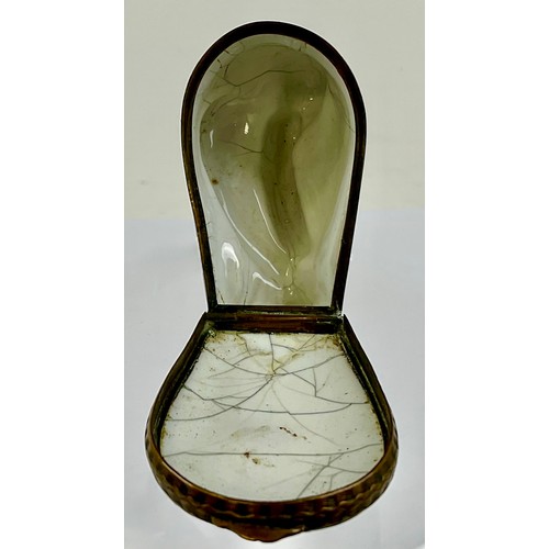 3031 - A George III South Staffordshire enamel and brass mounted bonbonniere, the hinged cover modelled as ... 