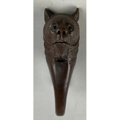 3001 - A Black Forest novelty lever-action nut cracker, carved as the head of a bear, glass eyes, 20.5cm lo... 