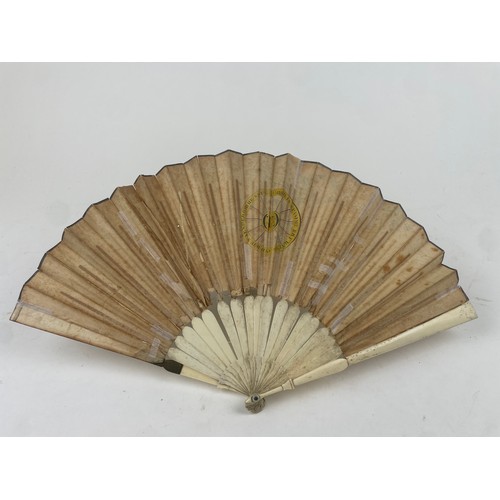 3030 - A George III paper and bone mounted conundrum type hand fan, by John Cock & Co., Wood Street, printe... 