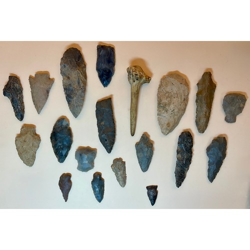 5009 - A Stone Age pressure flaked flint spear head; various Native American arrowheads including an Adena ... 