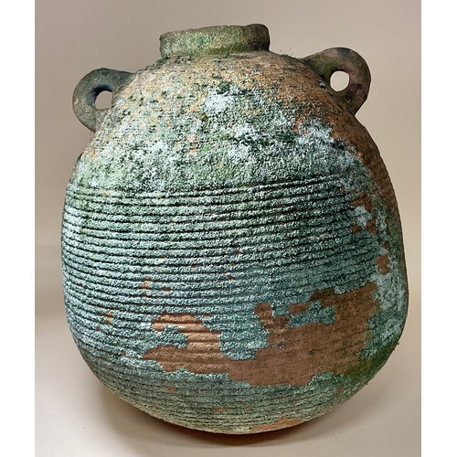 5029 - A ‘Graeco-Roman’ Palestinian bag-jar amphora of globular ribbed form twin loop carrying handles, 36c... 