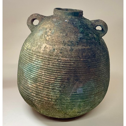 5029 - A ‘Graeco-Roman’ Palestinian bag-jar amphora of globular ribbed form twin loop carrying handles, 36c... 