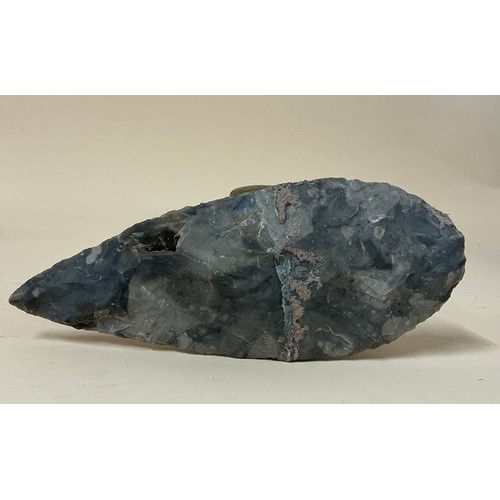 5035 - A collection of Neolithic pressure flaked and knapped flint hand tools and weapons including a leaf ... 