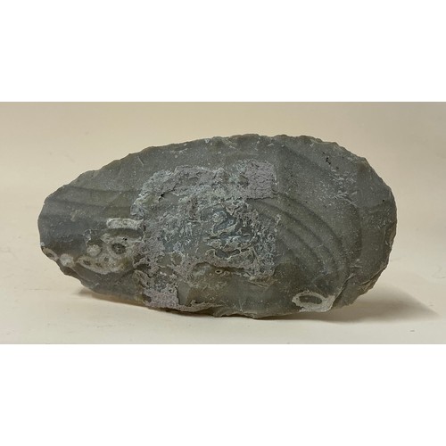 5035 - A collection of Neolithic pressure flaked and knapped flint hand tools and weapons including a leaf ... 