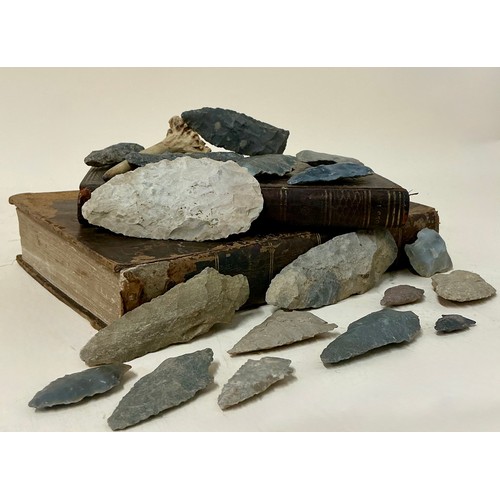 5009 - A Stone Age pressure flaked flint spear head; various Native American arrowheads including an Adena ... 