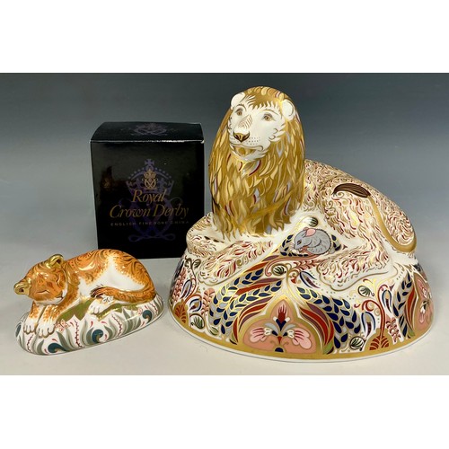 8 - A Royal Crown Derby paperweight of a Lion, silver stopper;  another, Lion cub, printed marks, gold s... 