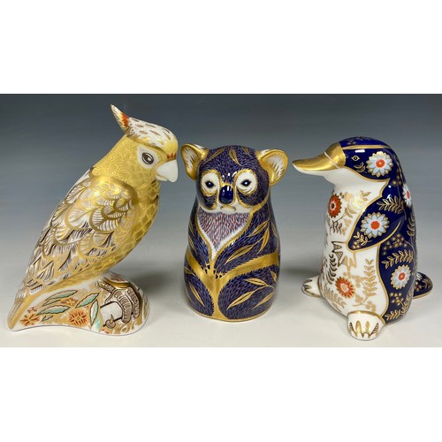 14 - Royal Crown Derby Paperweights - Citron Cockatoo, Duck-billed Platypus, Koala, all gold stoppers, (3... 