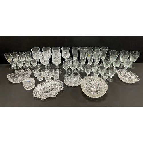 52 - Glassware - a set of eight Luminarc France cut glass champagne flutes, together with eight Luminarc ... 