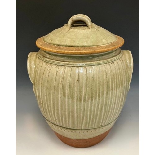49 - Richard Batterham (1936-2021) a fluted ash glazed beer jar and cover, unsigned, 37cm high overall