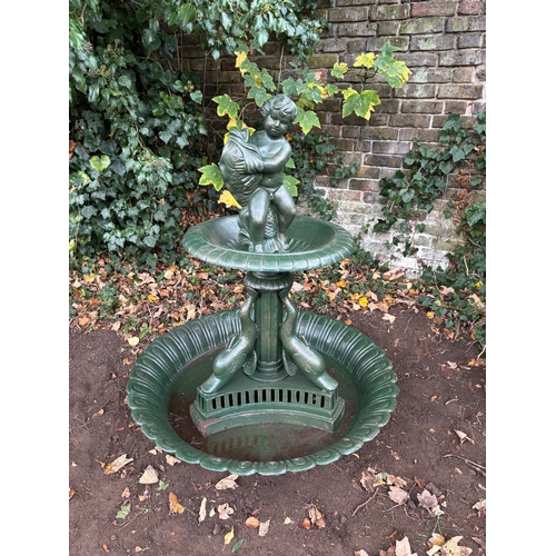 4011 - A delightful classical two-tier cast iron garden fountain, of a medium size, the finial is a seated ... 