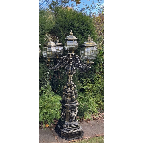 4031 - A magnificent and imposing classical cast iron five-light candelabra lamp post in the Gothic manner,... 