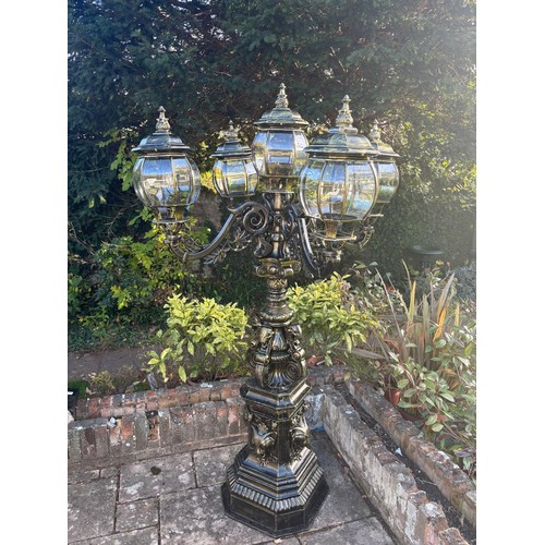 4031 - A magnificent and imposing classical cast iron five-light candelabra lamp post in the Gothic manner,... 