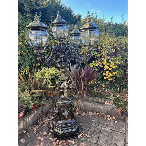 4031 - A magnificent and imposing classical cast iron five-light candelabra lamp post in the Gothic manner,... 