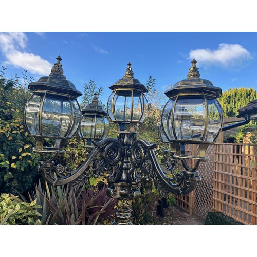 4031 - A magnificent and imposing classical cast iron five-light candelabra lamp post in the Gothic manner,... 