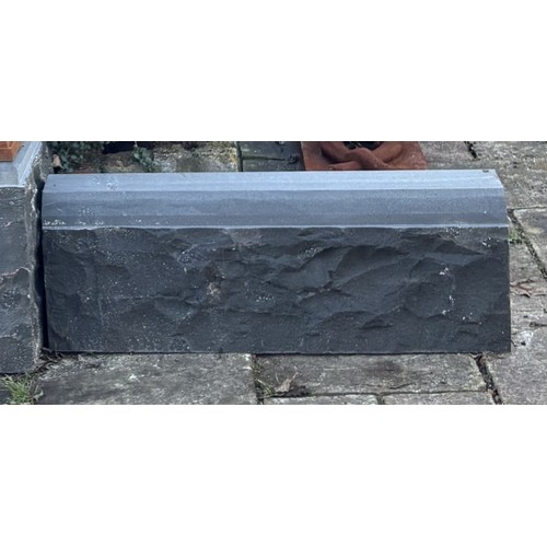 4035 - A collection of 50 natural split rough finish bluestone wall blocks, with intermediate square blocks... 