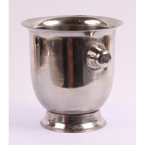 46 - A 20th century stainless steel champagne bucket, knop handles, circular foot, 26cm high overall, unm... 