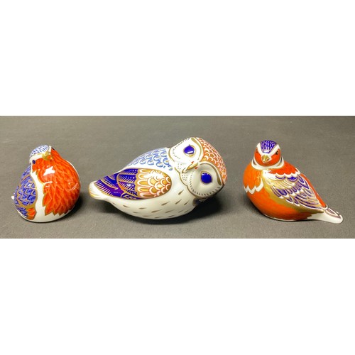 11 - Royal Crown Derby Paperweights - Chaffinch, Robin,  both gold stoppers, another Owl, pottery stopper... 