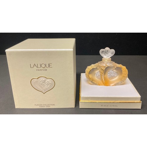 33 - A modern Lalique double heart shaped glass scent bottle, with most contents, 11cm high, boxed