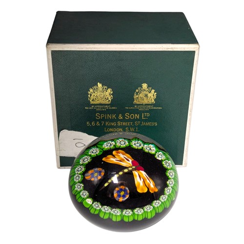 55 - A 20th century glass paperweight, in the style of Paul Ysart (1904-1991), dragonfly inclusion on a b... 