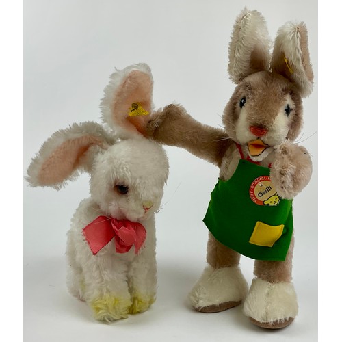3031 - Two Steiff bunny rabbits including ‘Ossili’, yellow label no.7800/30, another seated no.4940/22; mod... 