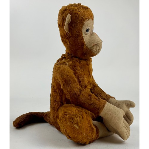 3035 - A mid 20th century novelty light brown mohair Monkey, cream stitched felt face, ears, hands and feet... 