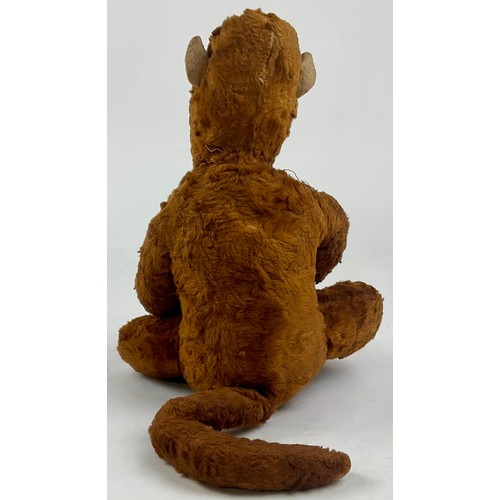 3035 - A mid 20th century novelty light brown mohair Monkey, cream stitched felt face, ears, hands and feet... 