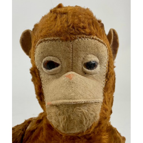3035 - A mid 20th century novelty light brown mohair Monkey, cream stitched felt face, ears, hands and feet... 