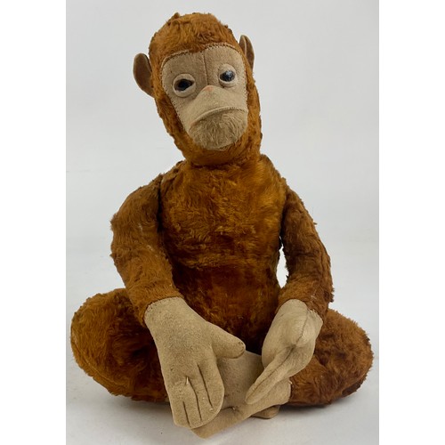3035 - A mid 20th century novelty light brown mohair Monkey, cream stitched felt face, ears, hands and feet... 