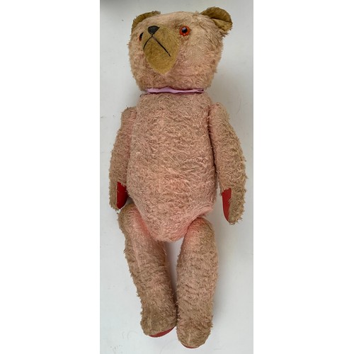 3046 - A large early 20th century pink mohair Teddy bear, amber eyes, pronounced muzzle with stitched nose ... 